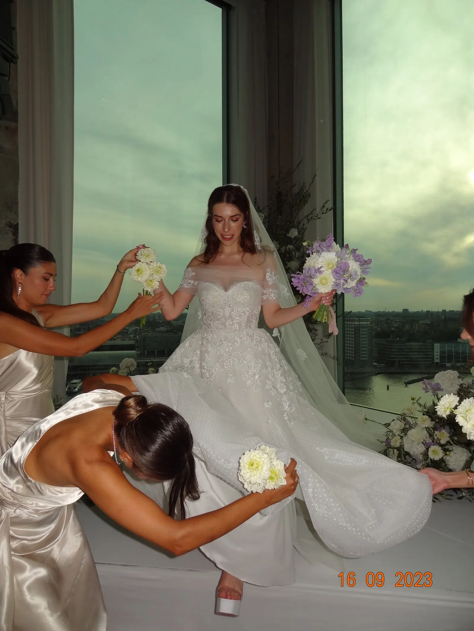 Özgür and Ömrüm on their wedding day in Amsterdam